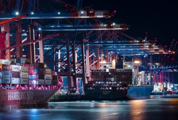 ships at port unloading shipping containers